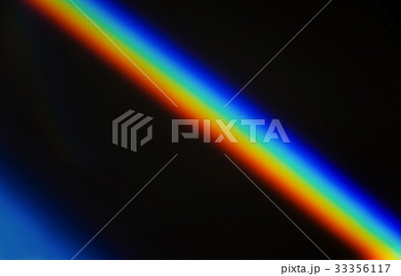Rainbow prism light against black 33356117