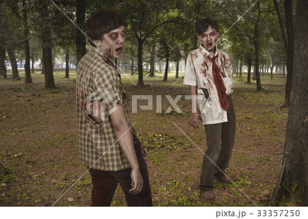 Aggressive two asian zombies man standing 33357250