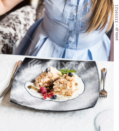 woman eating dessert woman eating dessert 33359521