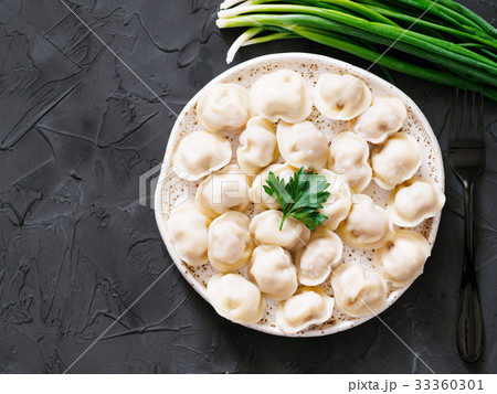 Russian pelmeni, ravioli, dumplings with meat Russian pelmeni, ravioli, dumplings with meat 33360301