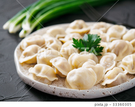 Russian pelmeni, ravioli, dumplings with meat Russian pelmeni, ravioli, dumplings with meat 33360305