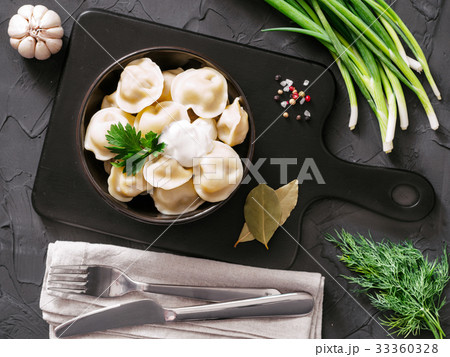 Russian pelmeni, ravioli, dumplings with meat 33360328