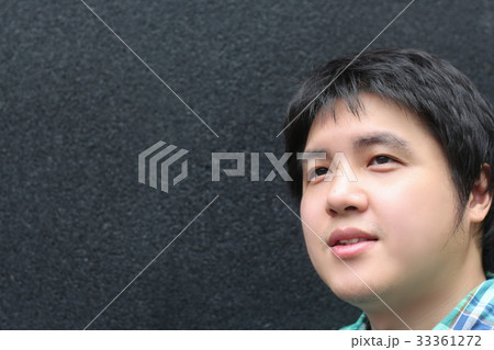 Asian man looking outside for the future 33361272