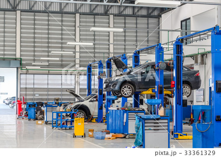 Car in the lifting equipment in the garage Car in the lifting equipment in the garage 33361329