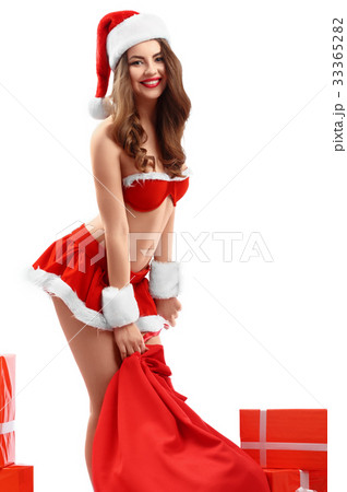 beautiful sexy young woman in red suit of Santa 33365282
