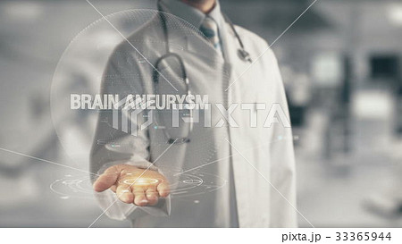 Doctor holding in hand Brain Aneurysm Doctor holding in hand Brain Aneurysm 33365944