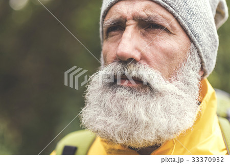 Thoughtful old man viewing natural scene Thoughtful old man viewing natural scene 33370932