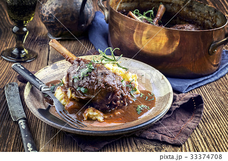 Slow Cooked Lamb Shanks in Red Wine Sauce Slow Cooked Lamb Shanks in Red Wine Sauce 33374708