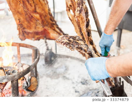 Argentinian asado roasted lamb grilled meat. 33374879