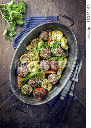 Rice Meatballs with Vegetable in Copper Pod Rice Meatballs with Vegetable in Copper Pod 33375190