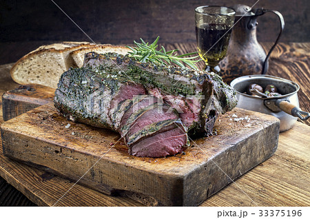 Barbecue Saddle of Venison on Cutting Board 33375196