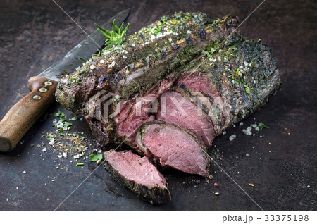 Barbecue Saddle of Venison on Cutting Board 33375198