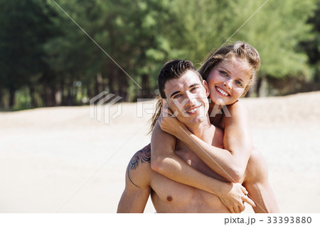 Man and woman having a good summertime together on the beautiful Man and woman having a good summertime together on the beautiful 33393880
