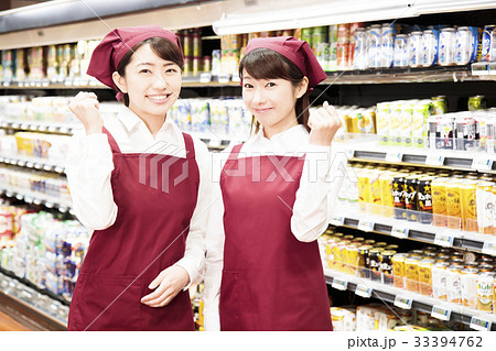 スーパー スーパーマーケット 店員 スタッフの写真素材