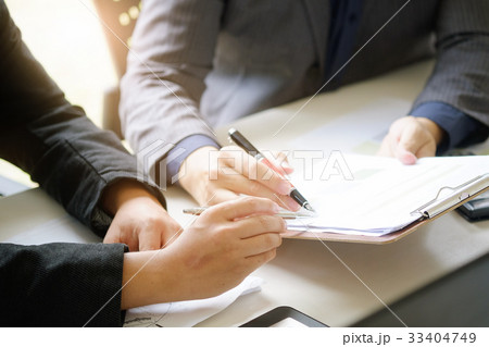 business man talking to consult report paper. 33404749