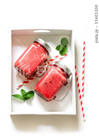 Two summer smoothie of watermelon on a white. Two summer smoothie of watermelon on a white. 33405300