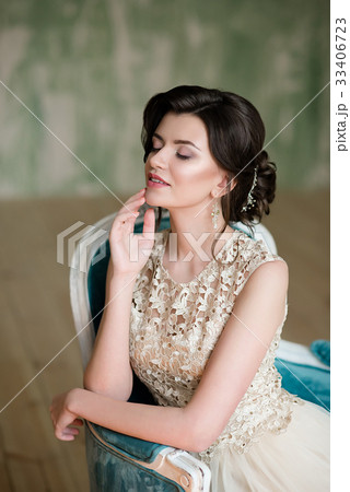 Image of elegant Brunette girl sitting in retro Image of elegant Brunette girl sitting in retro 33406723
