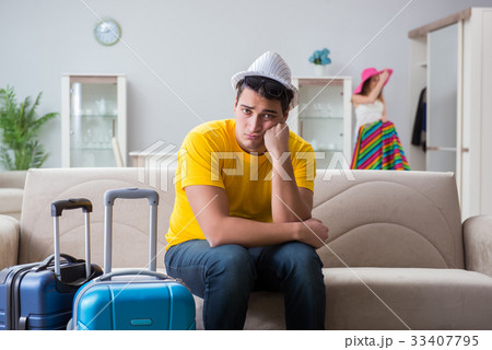 Young family preparing for travel vacation Young family preparing for travel vacation 33407795
