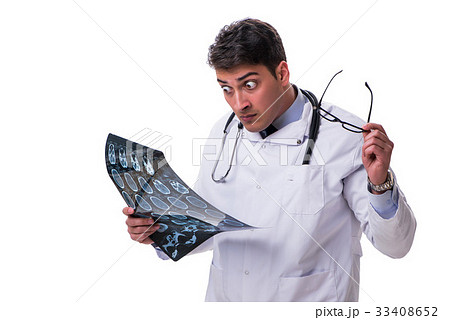 Young male doctor holding a radiograph isolated on 33408652