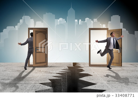 Businessman in teleportation concept with doors 33408771