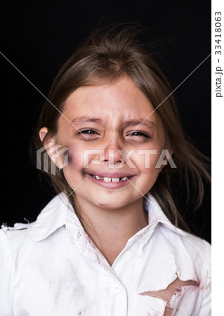 Child abuse. Sad and lonely girl crying 33418063