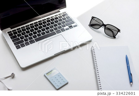 work desk with laptop and notebook 33422601