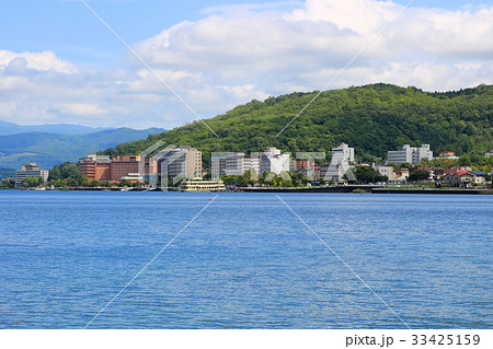 有珠山噴火記念公園から見る洞爺湖温泉街の写真素材