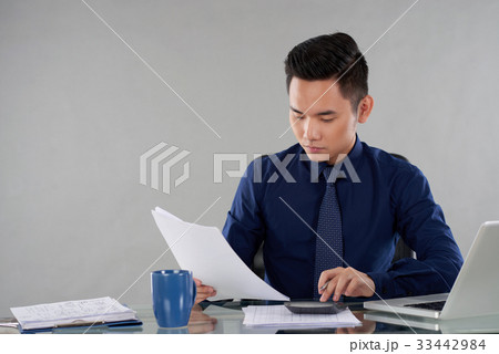 Checking business documents 33442984