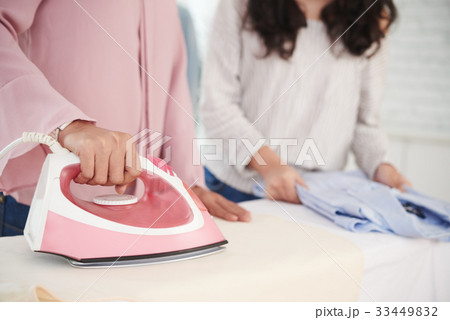 Ironing clothes Ironing clothes 33449832