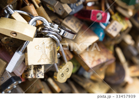 Love padlocks on the bridge Pont des Arts Love padlocks on the bridge Pont des Arts 33457939
