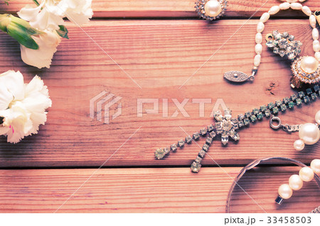 antique vintage necklace on wooden table 33458503