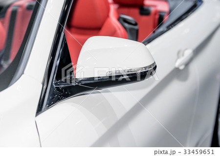 Close up of side mirror of car with turn signal. Close up of side mirror of car with turn signal. 33459651