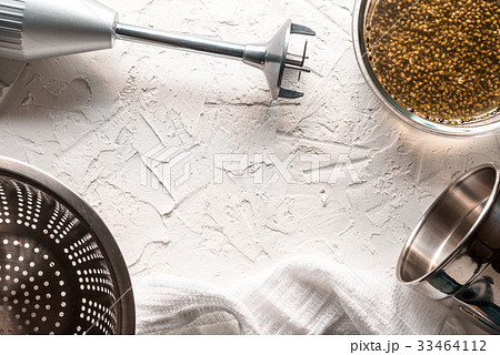 Bowl with cannabis seeds, a blender and a sieve on Bowl with cannabis seeds, a blender and a sieve on 33464112