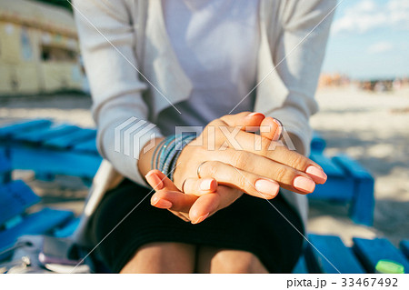 Beautiful hands with pink manicure of young woman 33467492