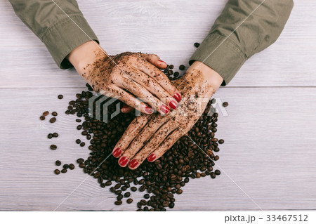 Women's hands with red nail polish 33467512