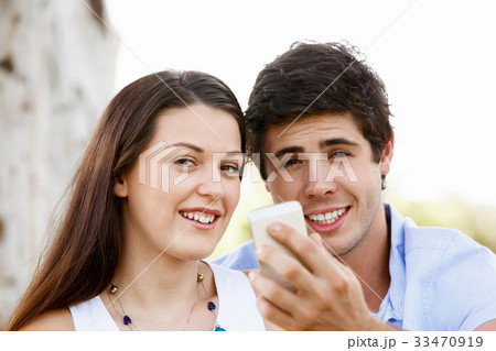 Young couple in the park Young couple in the park 33470919