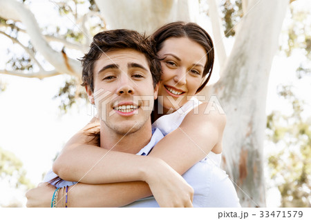 Young couple in the park Young couple in the park 33471579