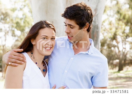 Young couple in the park Young couple in the park 33471581