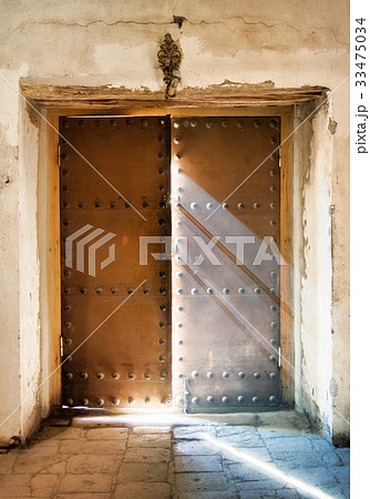 The church door almost close with light rays The church door almost close with light rays 33475034