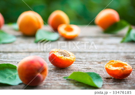 Beautiful ripe orange apricots with leaves  33476185