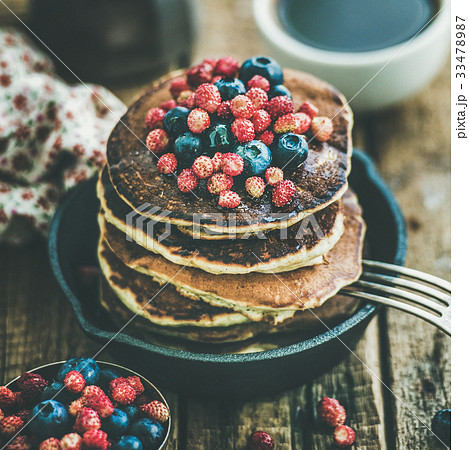 Breakfast with pancakes with forest berries and 33478987