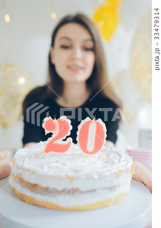 Young woman girl with cake isolated on white Young woman girl with cake isolated on white 33479314