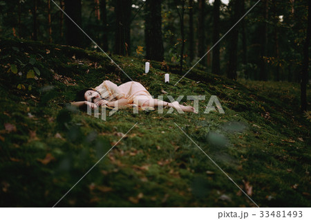 Portrait of a beautiful woman in the forest Portrait of a beautiful woman in the forest 33481493