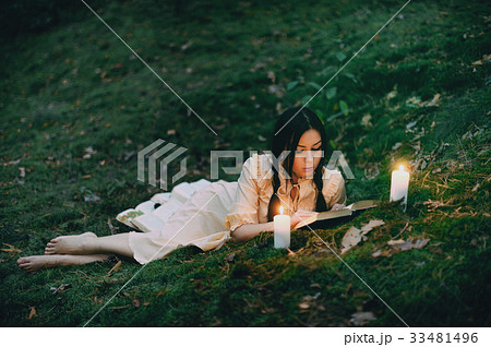 Portrait of a beautiful  woman in the forest 33481496