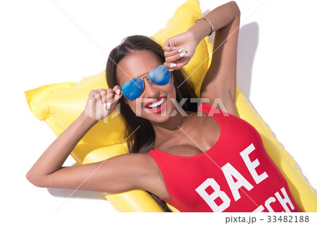 Sexy tanned brunette in sunglasses sunny shot 33482188