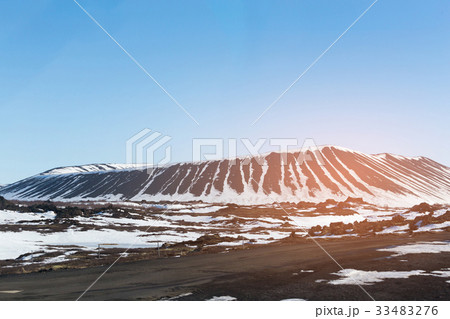 Winter season volcano with blue clear sky Winter season volcano with blue clear sky 33483276