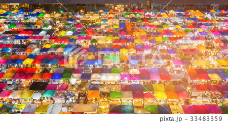 Aerial view multiple colour flea market Aerial view multiple colour flea market 33483359