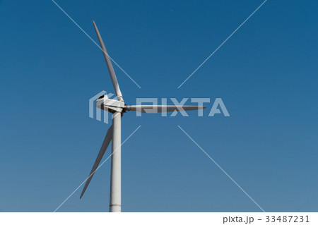 Windmill power generator against sky. Close up Windmill power generator against sky. Close up 33487231