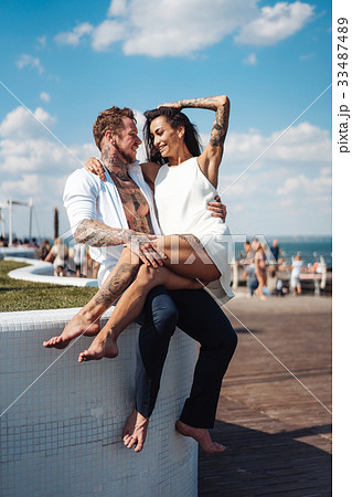 Girl and handsome guy outdoors Girl and handsome guy outdoors 33487489