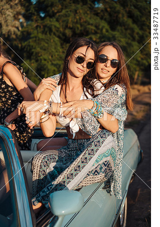 Two girls have fun in the countryside Two girls have fun in the countryside 33487719